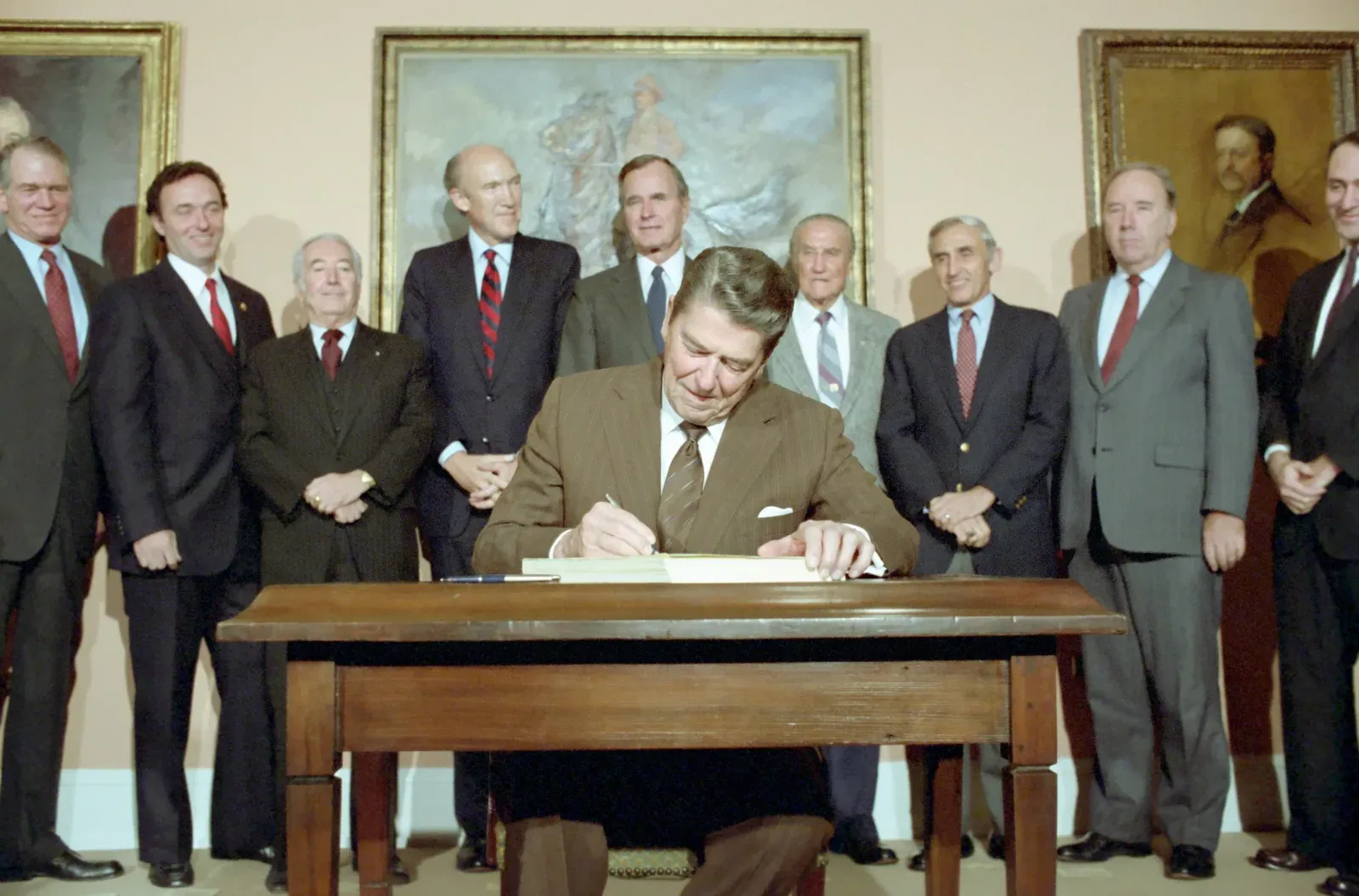 President Ronald Reagan signing the Immigration Reform and Control Act in 1986.