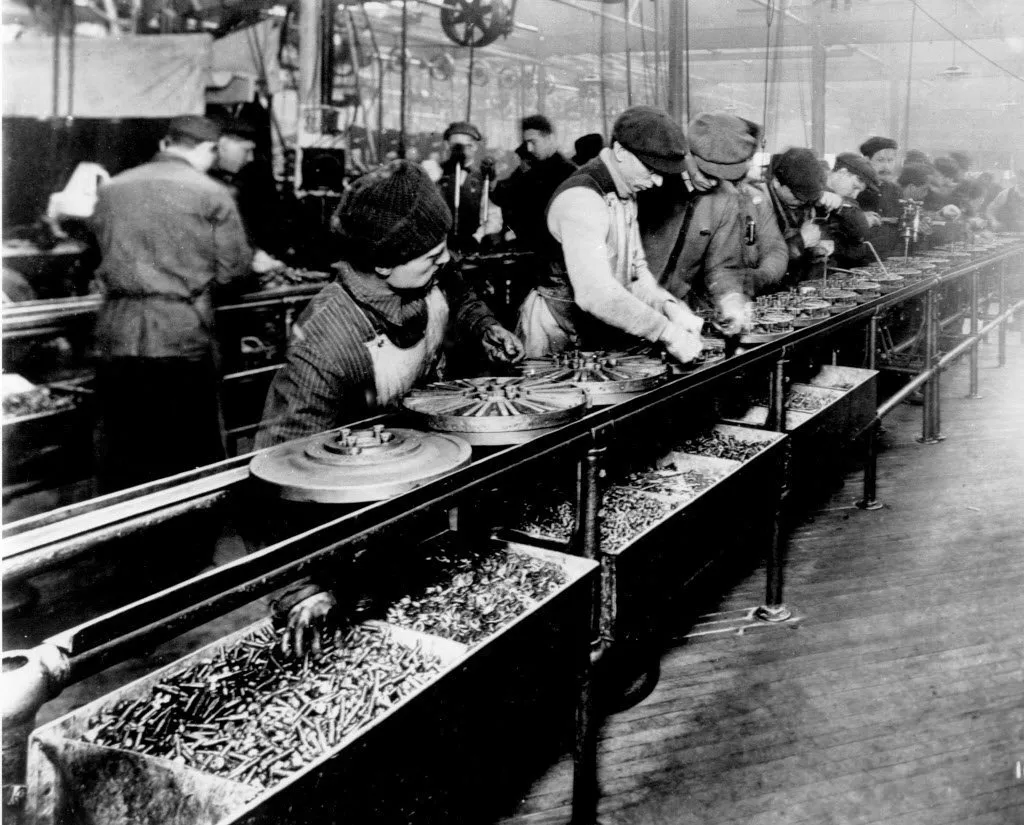 Historical photograph illustrating Taylorism — scientific management and the time-and-motion study of factory work.
